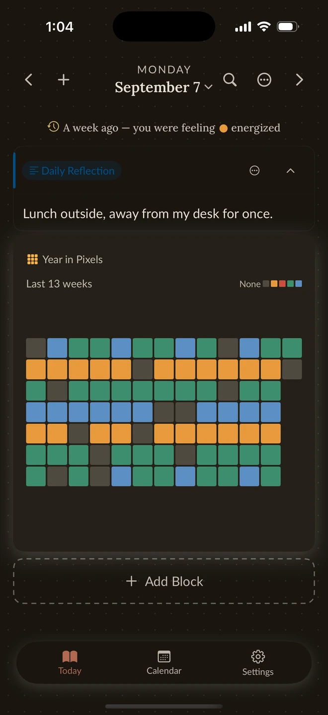 Vivid's Year in Pixels block in a dark theme, showing thirteen weeks of logged moods as colored squares